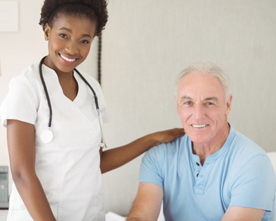 a nurse taking care of a senior man