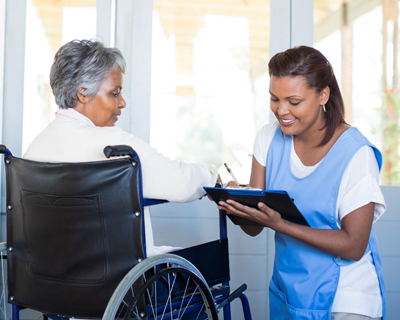 a medical social worker filling out forms