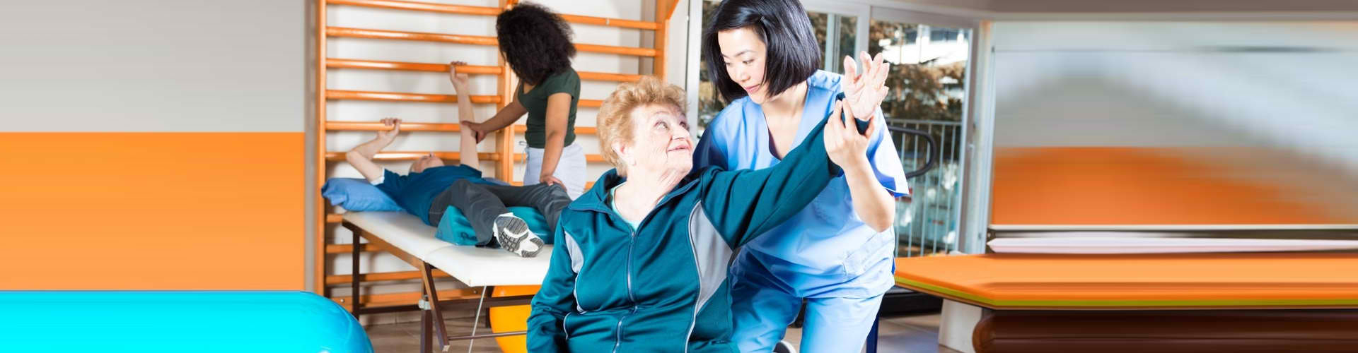 a physical therapist doing therapy to a senior woman