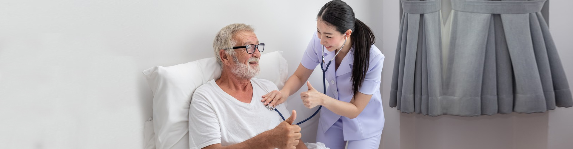 a nurse checking the blood pressure of a senior man