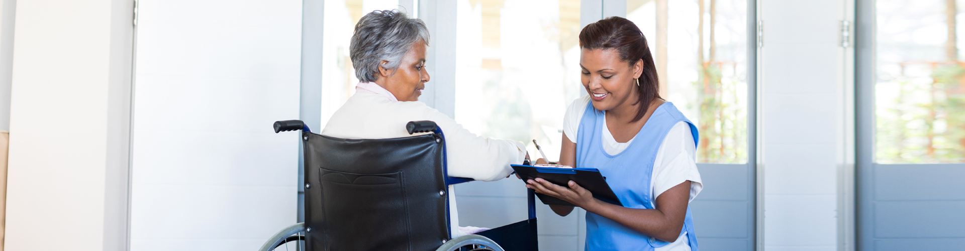 a medical social worker filling out forms